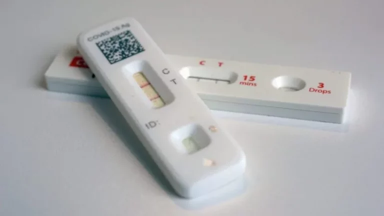 FILE – COVID-19 antigen home tests indicating a positive result are photographed in New York, April 5, 2023. Americans will be able to order four free COVID-19 tests again and the United States Postal Service will deliver the tests to your mailbox. Anyone who did not order a batch of COVID-19 tests in September can secure up to eight of the tests this time around. (AP Photo/Patrick Sison, File) -e1721164587854