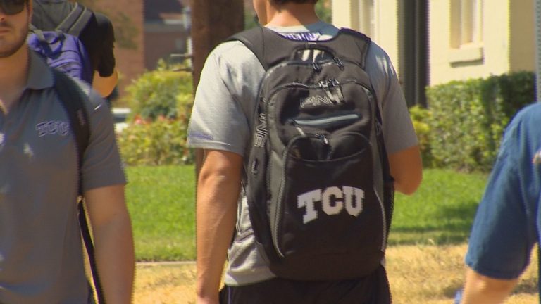 Students walk through TCU's campus. / By: Shomial Ahmad (The Texas Tribune)