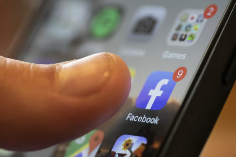 FILE - An iPhone displays the Facebook app (AP Photo/Jenny Kane, File) (Jenny Kane, Copyright 2019 The Associated Press. All rights reserved.)