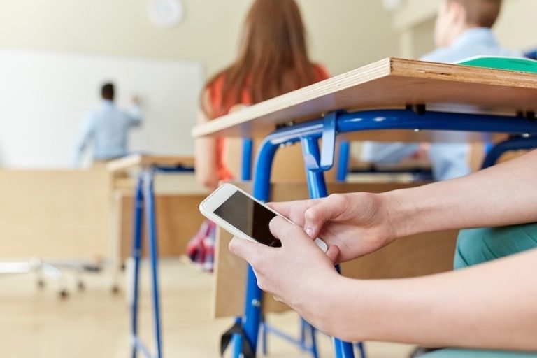 School districts across Texas—including nine in Community Impact's coverage areas—have recently tightened their electronic device policies, which range from complete bans to limiting when students can use their phones. (Courtesy Adobe Stock)