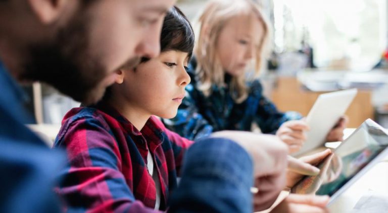 The education system designed to teach them how to think critically has been weaponized by the radical left to push an anti-American agenda.  Maskot/Getty Images