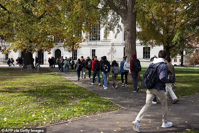 Students walk across the campus of The Ohio State University in Columbus, Ohio, where administrators lavish $13 million on DEI salaries every year